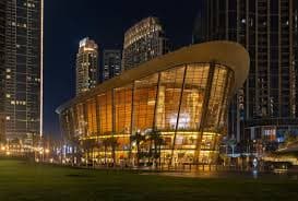 Exterior of Dubai Opera House at dusk, Downtown Dubai.