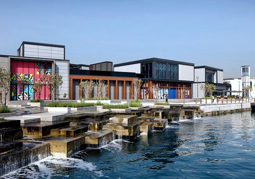 Marsa Al Seef waterfront development at dusk.
